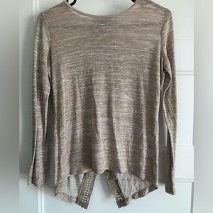 Beige long sleeve shirt with detailed back